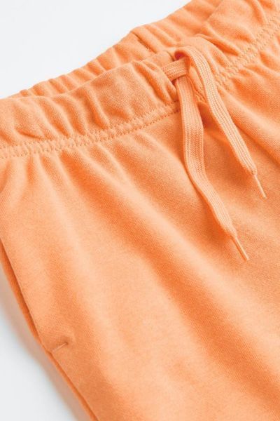 Спортивні брюки H&M пд8562 помаранчеві 2200000250360 фото